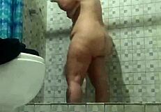 Hidden Camera In Shower Spying On Mature Stepmother?