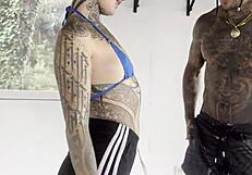 Tattooed sexy princess undergoes intense training session with DamiLVs in bold gay action.
