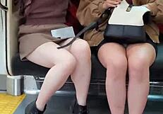 Japanese cuties teasing with upskirts on train ride