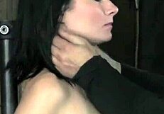 Whipping submissive in bondage with ring gag