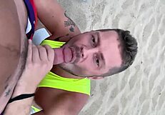 Watch the gay blowjob on the beach