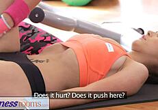 Fitness rooms: Huge tits babe rubs wet pussy on gym cutie