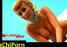 In the bathtub, blonde MILF Malena Gracia reveals her big tits and ass completely naked