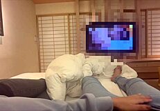 college girl hangs out with male friend at love hotel watching movies.