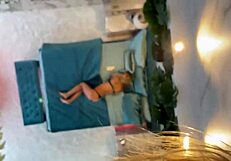 Monika fox poses naked on the bed.