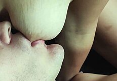 Saggy tits get sucked in closeup detail.