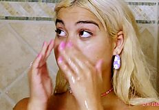 I watched the adorable blonde take a relaxing shower