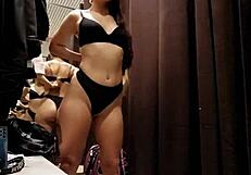 Tanned girl gets off with risky public fitting room play