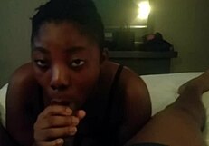 black ebony woman in a stunning black outfit