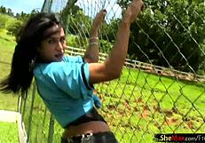 Dark haired latina shemale jerks off big cock outdoors