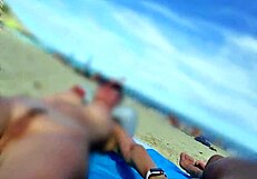 Missspisss shows big cock on Mallorca beach in public