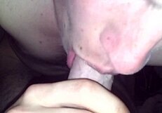 The gay guy gives a blowjob to a nice big cock, sucking it deep and hard.