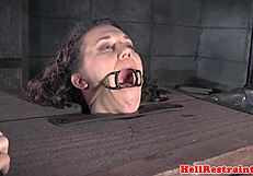 the restrained sub faces bastinado punishment from her master