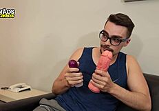 The old man gives a huge dildo to the naughty boy before the gay blowjob.