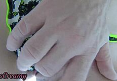 Teen student swims in the public pool with friends nearby