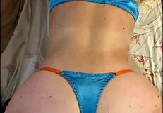 French amateur in leather pants and satin lingerie teases with heels and thong in POV