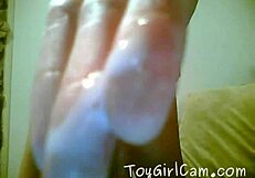 Watch this cam girl play with her pussy and dildo.