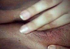 Homemade video of husband fingering wife's wet pussy.