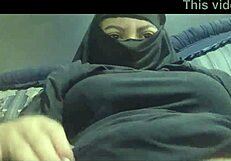 arab amateur milf flaunts big tits and squirts in hijab dress