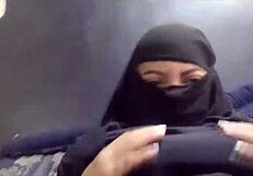 arab amateur milf flaunts big tits and squirts in hijab dress