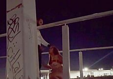 Damn, this couple’s banging hard on the bridge right now!