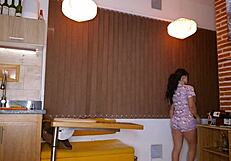 A brunette wife cheats on her husband with a young neighbor, gagging on his cock and achieving orgasm in a homemade scene.