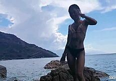 Man, that huge cock dominates tiny pussy at the ocean