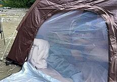 Amateur college girl holds back voice during tent fellatio in outdoor camp