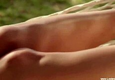 Tan girlfriends enjoy outdoor sex with licking and kissing