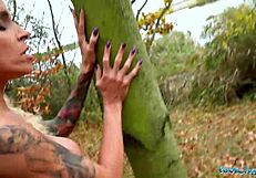 Tattooed busty German blonde MILF in public.