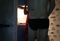 Asmodey and Jasper, the puppies, are cooking dinner together in the kitchen. They make quite a team!