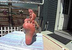 bikini babe with blonde girlfriend shows feet and toes in fetish play