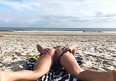 milf toys with a stranger's cock on the beach for sneaky fun.