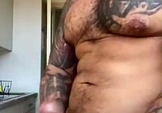what's viktor rom doing with his big black cock? massive latino muscle man in a cage