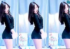 this cute and sexy korean girl is dancing in a fun way