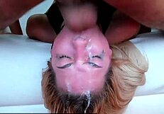 watch this blonde teen get her throat fucked upside down, leaving her face dripping with saliva in this intense session