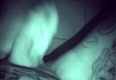 Late night solo session with tattooed performer in quiet room