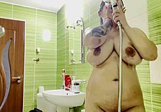 Hot Tattooed Woman with Big Tits Masturbating in Shower