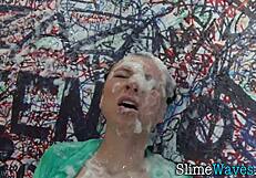 glamour whore rides toy at gloryhole