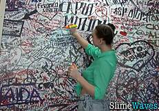 glamour whore rides toy at gloryhole