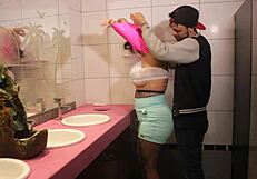 A slutty woman enjoying herself at a party in the bathroom