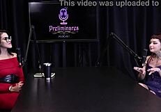 Annie Clementine humiliates in podcast with Bia Hot, handjob in see-through lingerie outdoors.