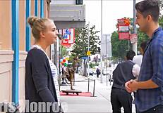 Passionate kissing with girlfriend in public outdoor setting