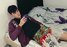 caught my stepson with his tantaly doll, so i grabbed his cock to help.