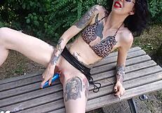 Lucy Ravenblood smoking while dildoing pussy in public park