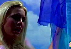 Watch the gorgeous blonde finger herself then get fucked cowgirl by brunette with strap-on