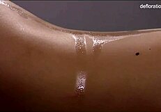 Jennifer Lorentz gives an incredibly hot massage to a virgin babe