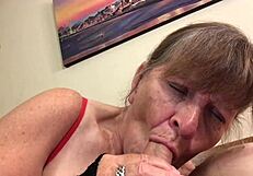Granny in Red Masters Deep Throating Cock.