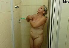 Stepmom catches son jerking off and fucks him in the shower!