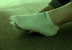 dirty socks hidden in sneakers